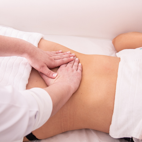 deep tissue massage being performed on the stomach